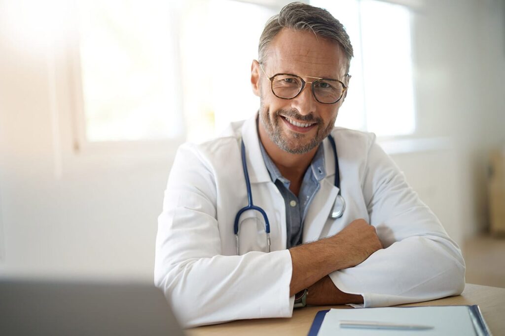 doctor in glasses discusses how to get a second opinion without a referral