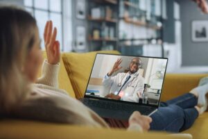 employee retention increasing as a result of patient on couch talking with doctor virtually