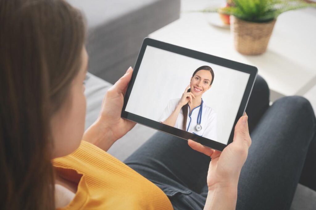 woman in yellow shirt getting a second opinion on chronic illness