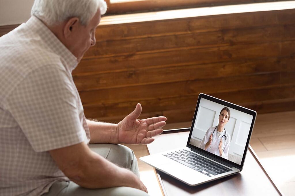man in white shirt getting an online second opinion