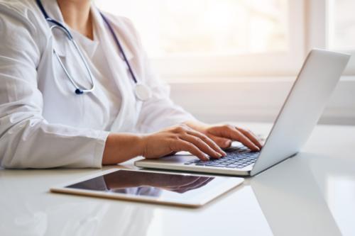 doctor on laptop offers a bi-rads 3 second opinion