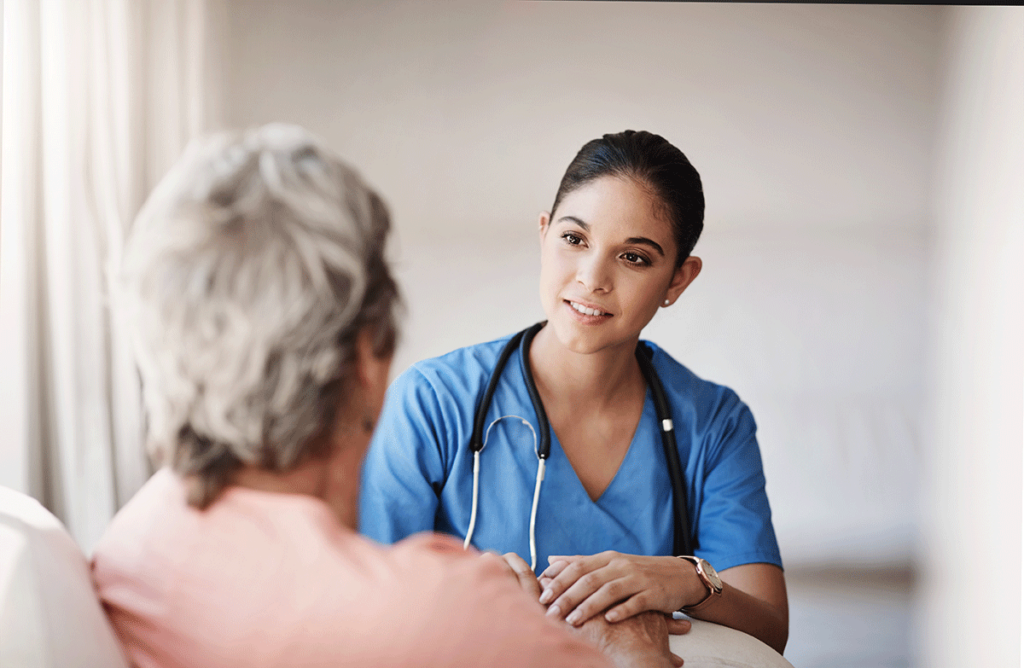 woman talks with nurse about a mesothelioma second opinion